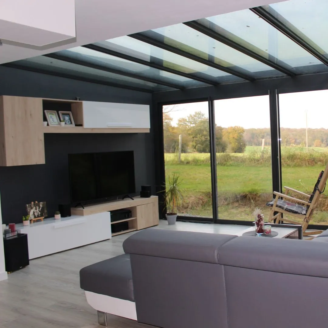 Extension avec toiture vitrée